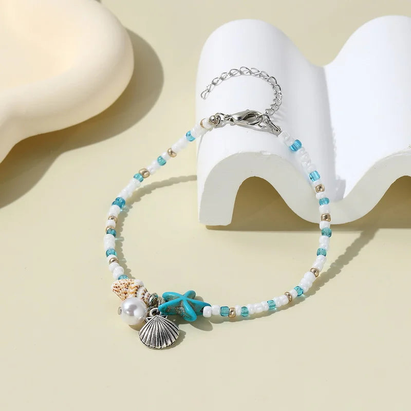 Fußkette Boho – Muschel, Seestern & Reisperlen, handgefertigt, Modell 21